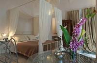 A bed or beds in a room at Dimore Santagaeta