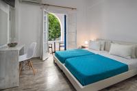 Postel nebo postele na pokoji v ubytování Villa Kavallaris & Apartments