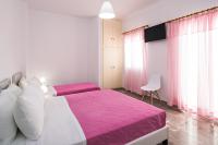 Postel nebo postele na pokoji v ubytování Villa Kavallaris & Apartments