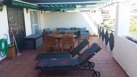 Posedenie v ubytovaní Bonito apartamento en Nueva Andalucia