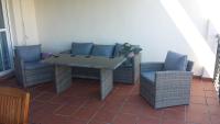 Posedenie v ubytovaní Bonito apartamento en Nueva Andalucia