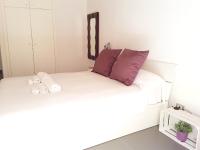 A bed or beds in a room at Cassari UpArtments