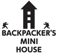 two people running on top of a hill with the textkeeper min house at Backpacker&#39;s Mini House in Tokyo