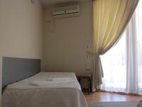 Postel nebo postele na pokoji v ubytování Family Hotel Bistritsa