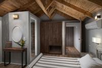 Postel nebo postele na pokoji v ubytování Morfeas Hotel