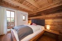 Posteľ alebo postele v izbe v ubytovaní Chalets Almidylle
