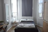 Posteľ alebo postele v izbe v ubytovaní Megaron11 Apartments