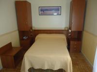 Posteľ alebo postele v izbe v ubytovaní Hotel Riviera