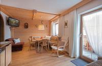 Posedenie v ubytovaní Haus Amann