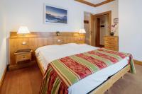 Posteľ alebo postele v izbe v ubytovaní Hotel Aquila