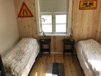 En eller flere senger på et rom på Tangs