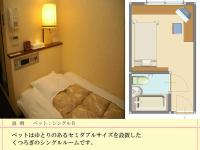 ホテル　ロスイン高知にあるベッド