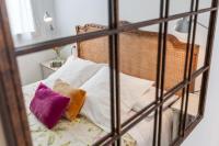Posteľ alebo postele v izbe v ubytovaní Apartamentos Plaza Pilatos