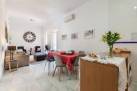 Posedenie v ubytovaní Apartamentos Plaza Pilatos