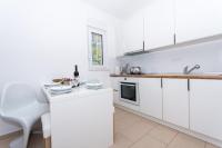 Kuchyňa alebo kuchynka v ubytovaní Villa Anastasia