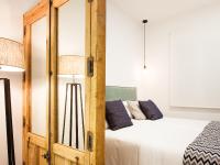 Postel nebo postele na pokoji v ubytování Jardines Boutique