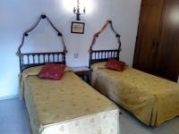 Posteľ alebo postele v izbe v ubytovaní Hostal Meson la Cadena
