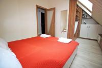 Postel nebo postele na pokoji v ubytování Lilly Apartments