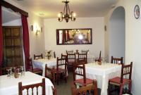 Reštaurácia alebo iné gastronomické zariadenie v ubytovaní Hostal Meson la Cadena