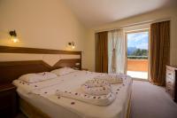 Postel nebo postele na pokoji v ubytování Valeri Beach Hotel