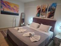 Theo and MS Luxurious Apartments by Filos Inc