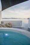 Three Domes Oia - an Iconic Collection