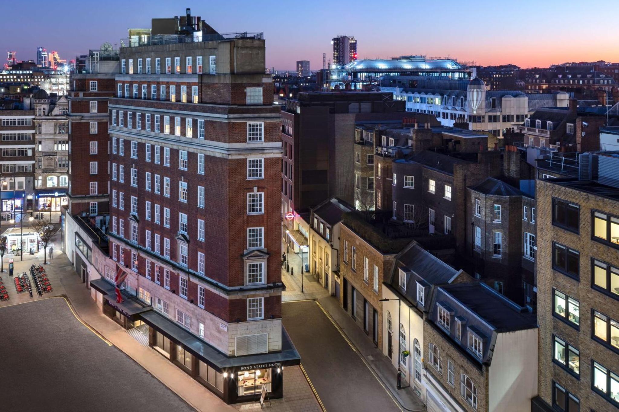 an aerial view of a city at night at Radisson Blu Hotel, London Bond Street in London