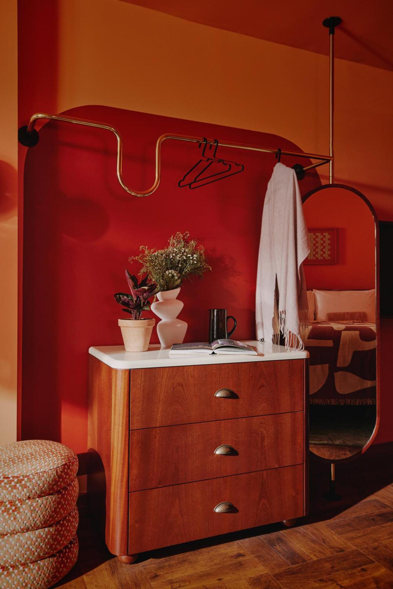 a bathroom with a sink and a mirror at Ember Locke Kensington in London