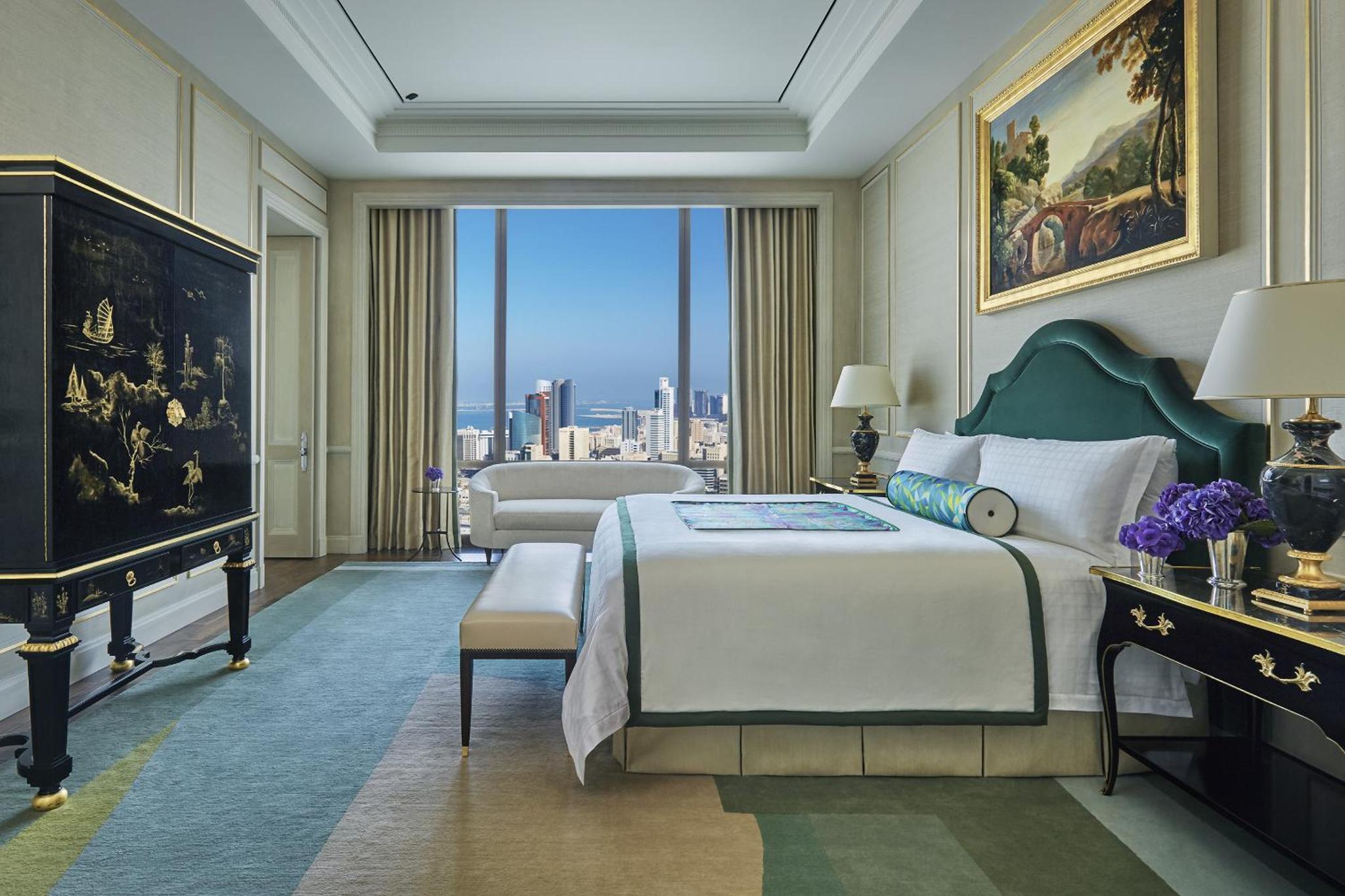 a bedroom with a large bed and a large window at Four Seasons Hotel Bahrain Bay in Manama +56 photos