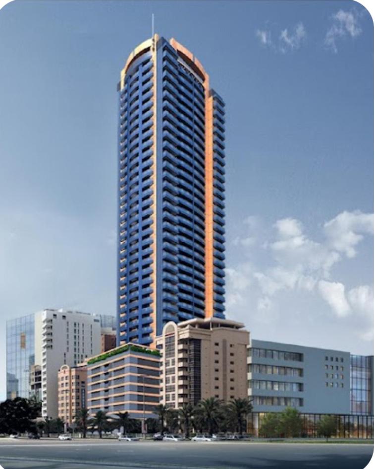 a rendering of a tall building in a city at Holiday Homes- Apartment in Manama
