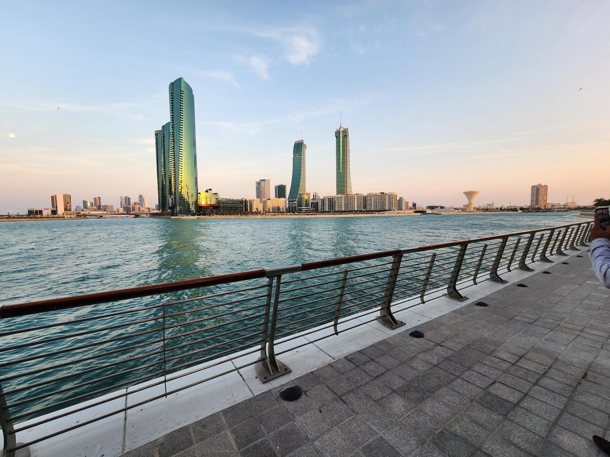 a view of a city from the water at Stunning Sea View 3BR Duplex in Reef Island in Sanābis