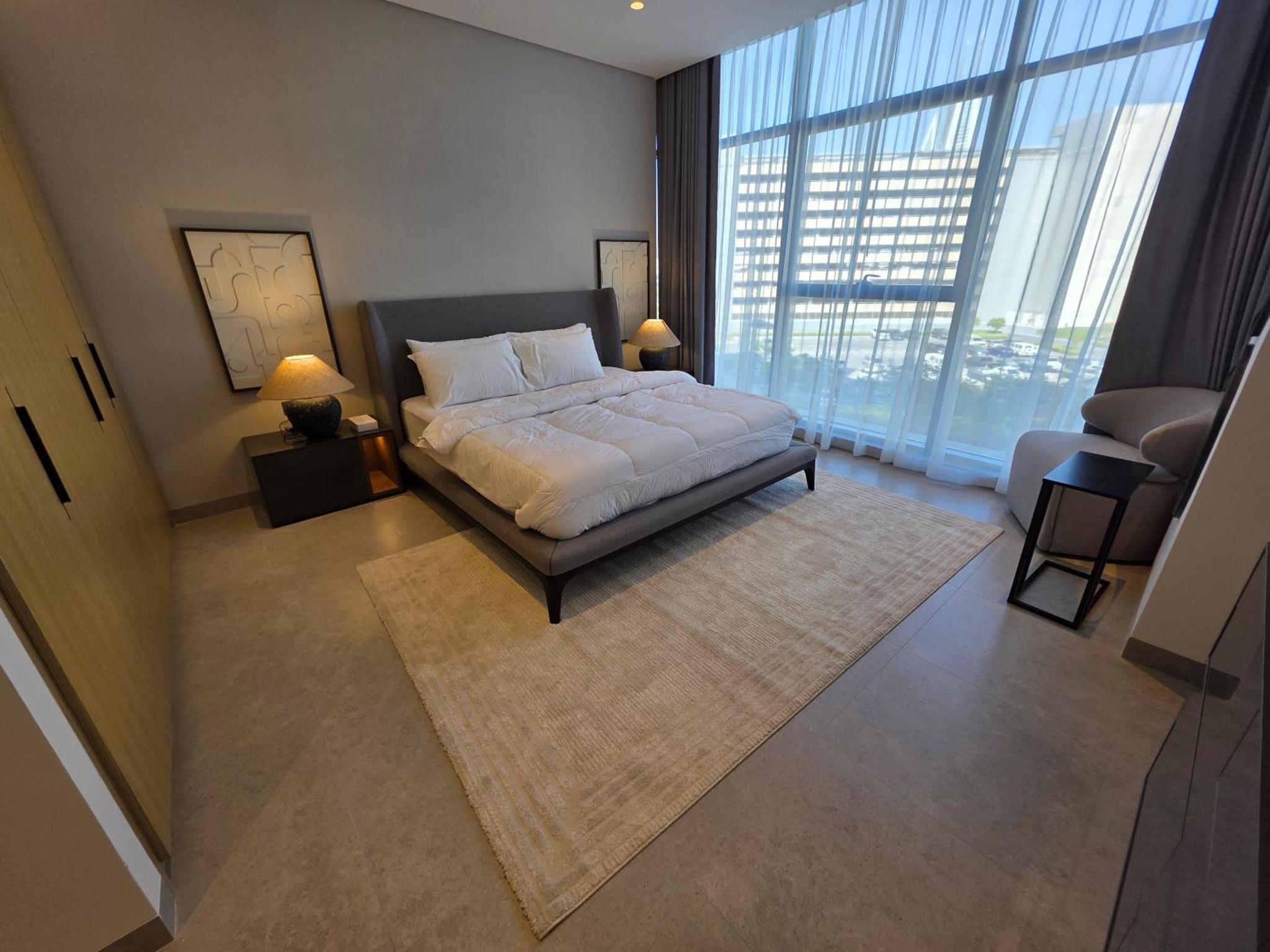 Elegant 1BR with Balcony PearlHouse Luxury Living!