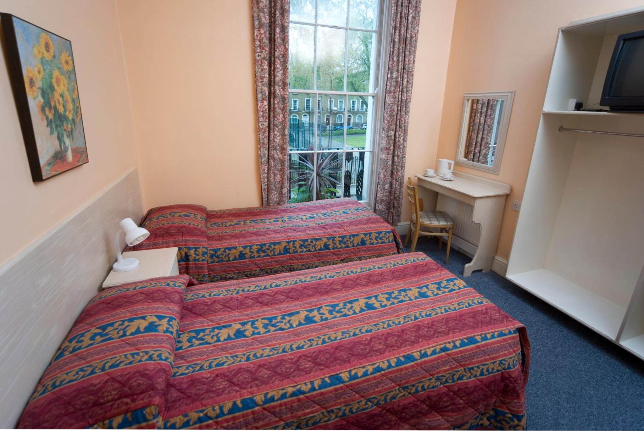 Quadruple Room with Private Bathroom