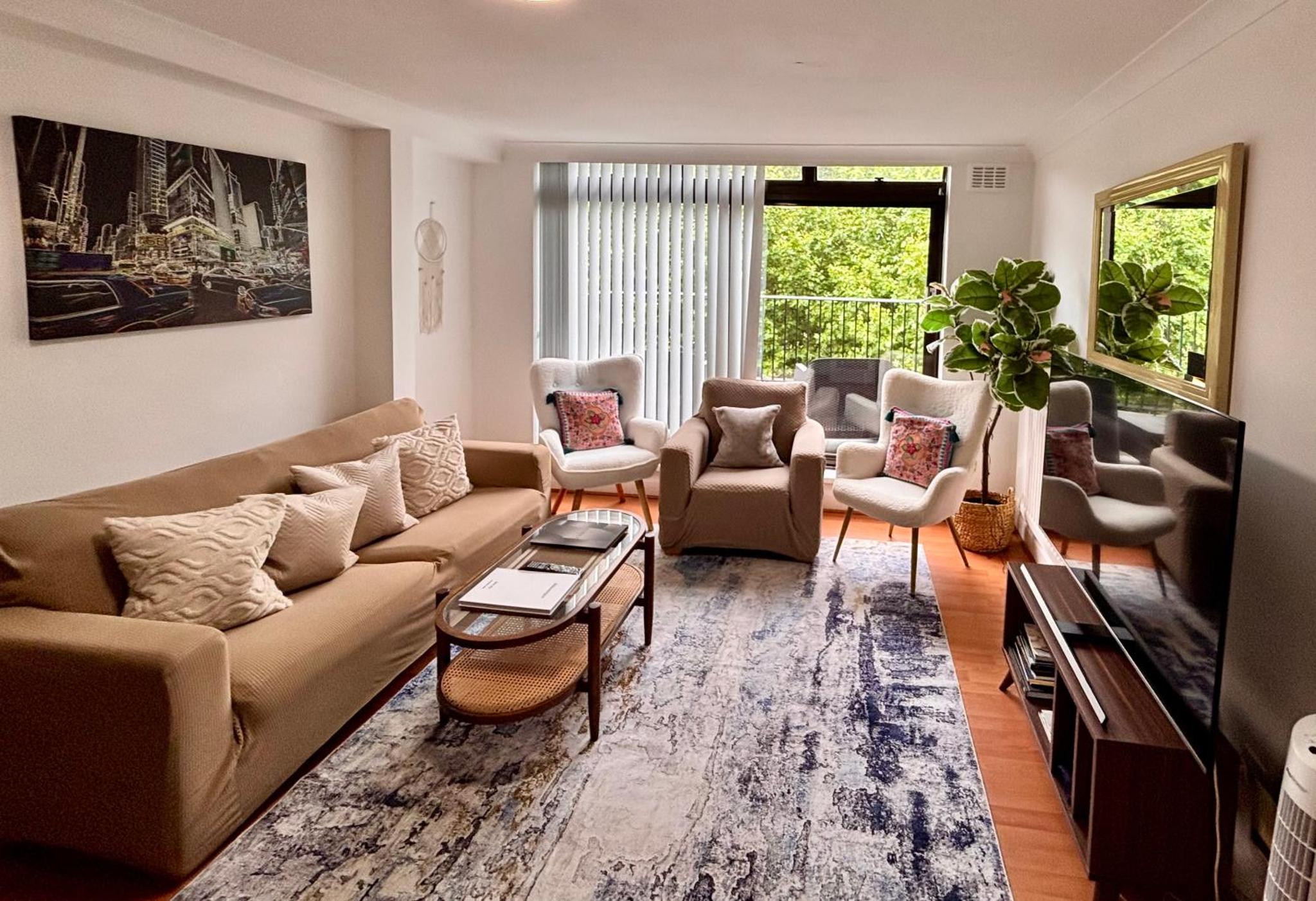 a living room with a couch and chairs at Hyde park,2 Bedrooms 2Bathrooms, Perfect for Families! 6th floor, no lift temporarily! in London