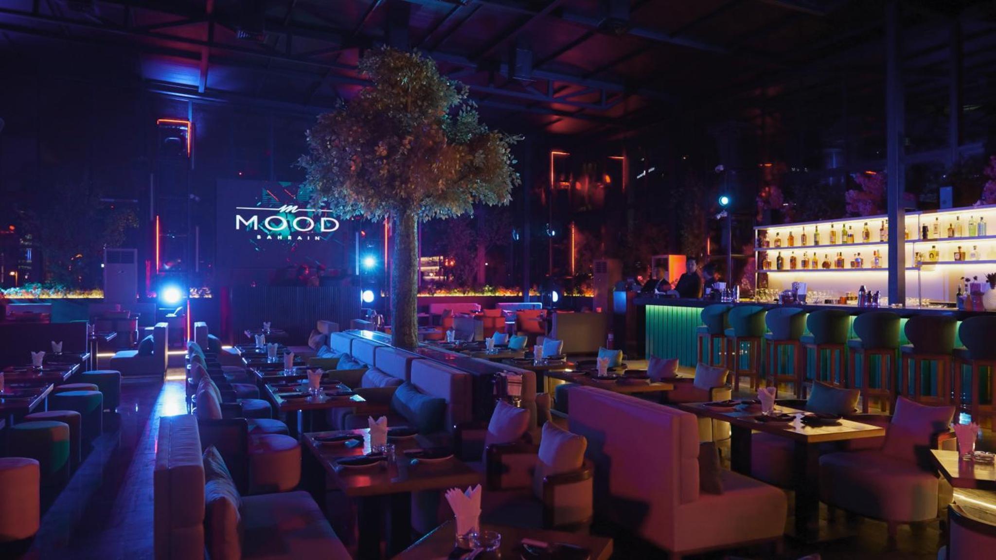 a restaurant with tables and chairs in a room at Royal Saray Resort in Manama +48 photos