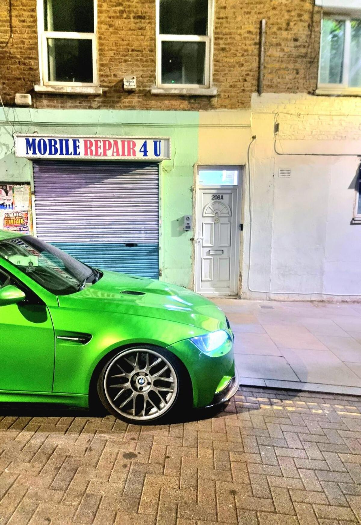a green car parked in front of a garage at Spacious 2BR, Fast Trains - Calm South London Stay in London