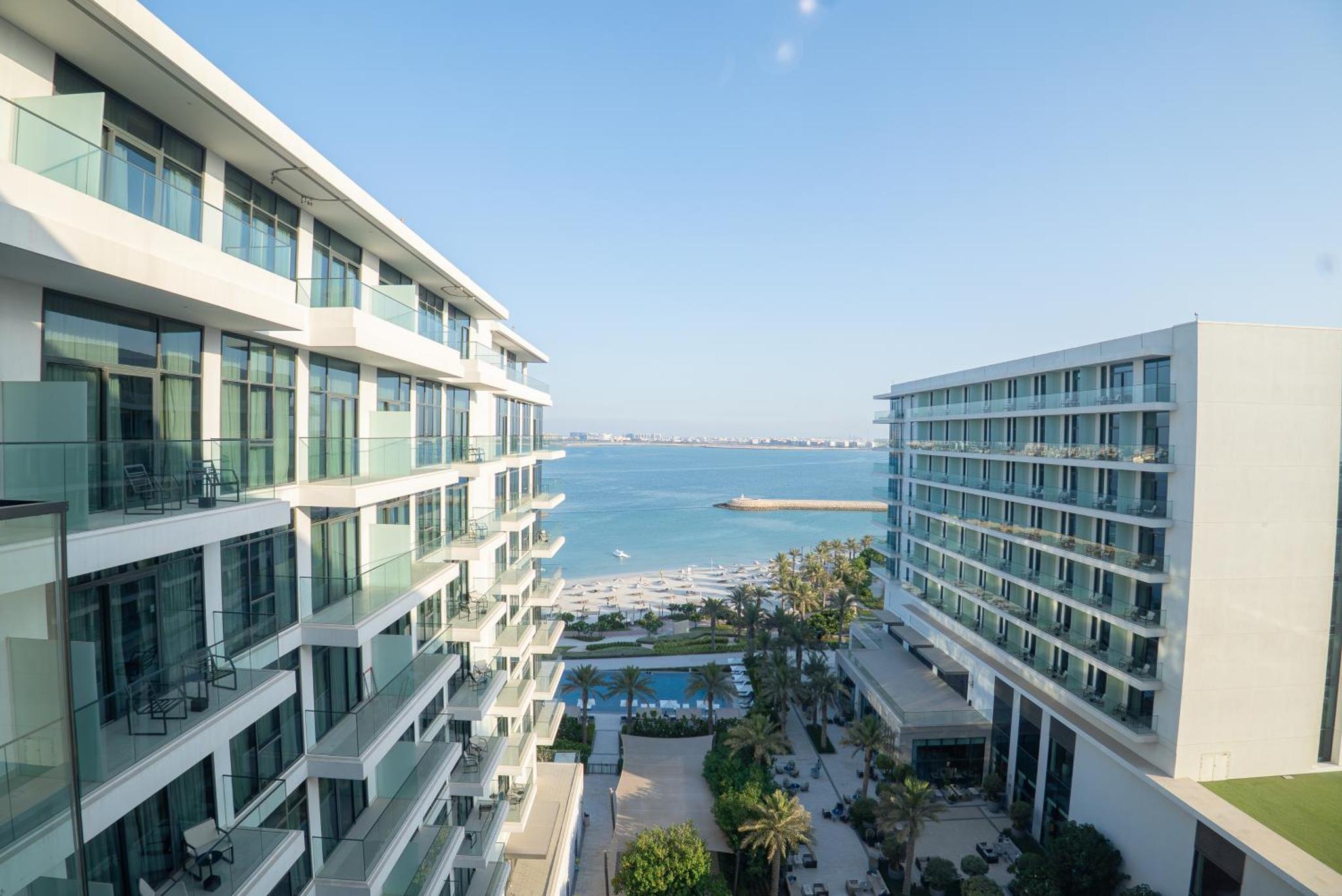 a view of the ocean from a building at Address Beach Resort Residence Bahrain in Rayyā