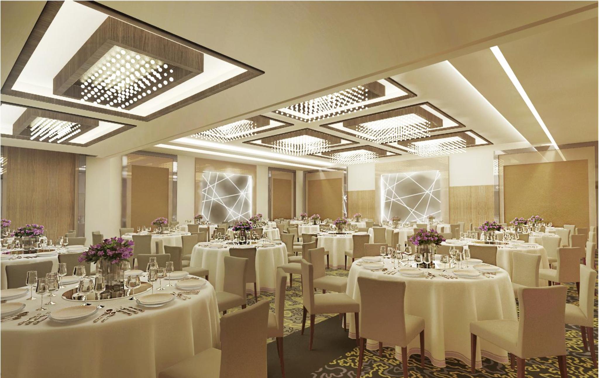 a banquet hall with white tables and chairs at Golden Tulip Bahrain in Manama +63 photos