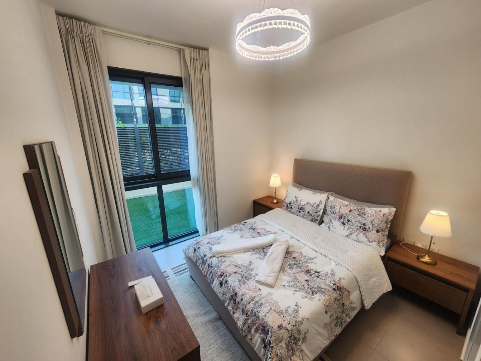 Luxury 2BR with Private Garden Marassi Living