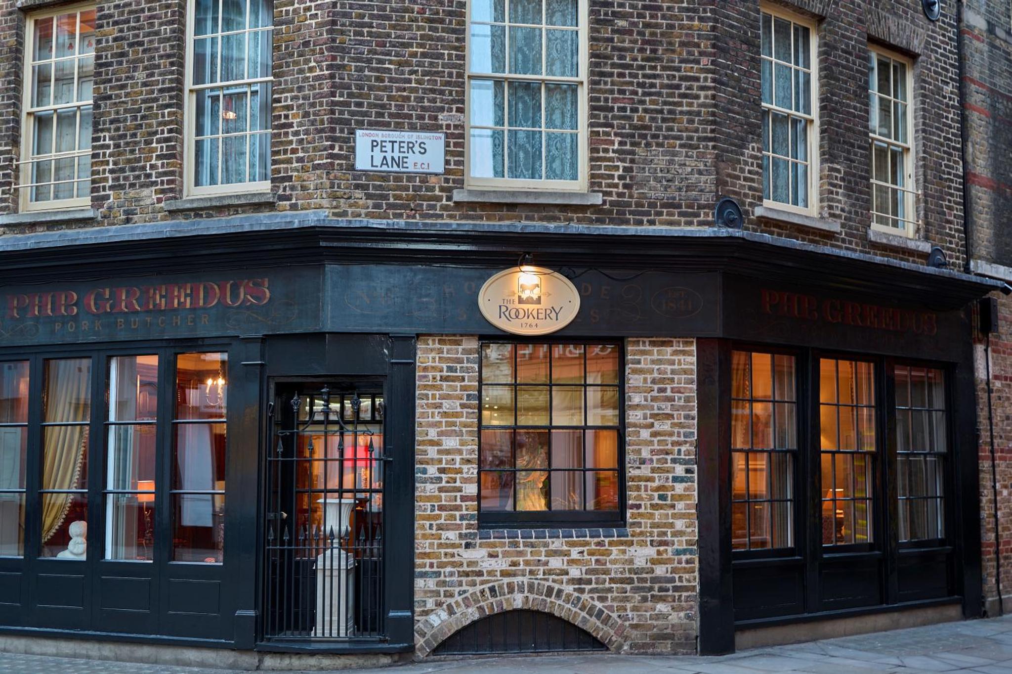a store front of a brick building with windows at The Rookery in London