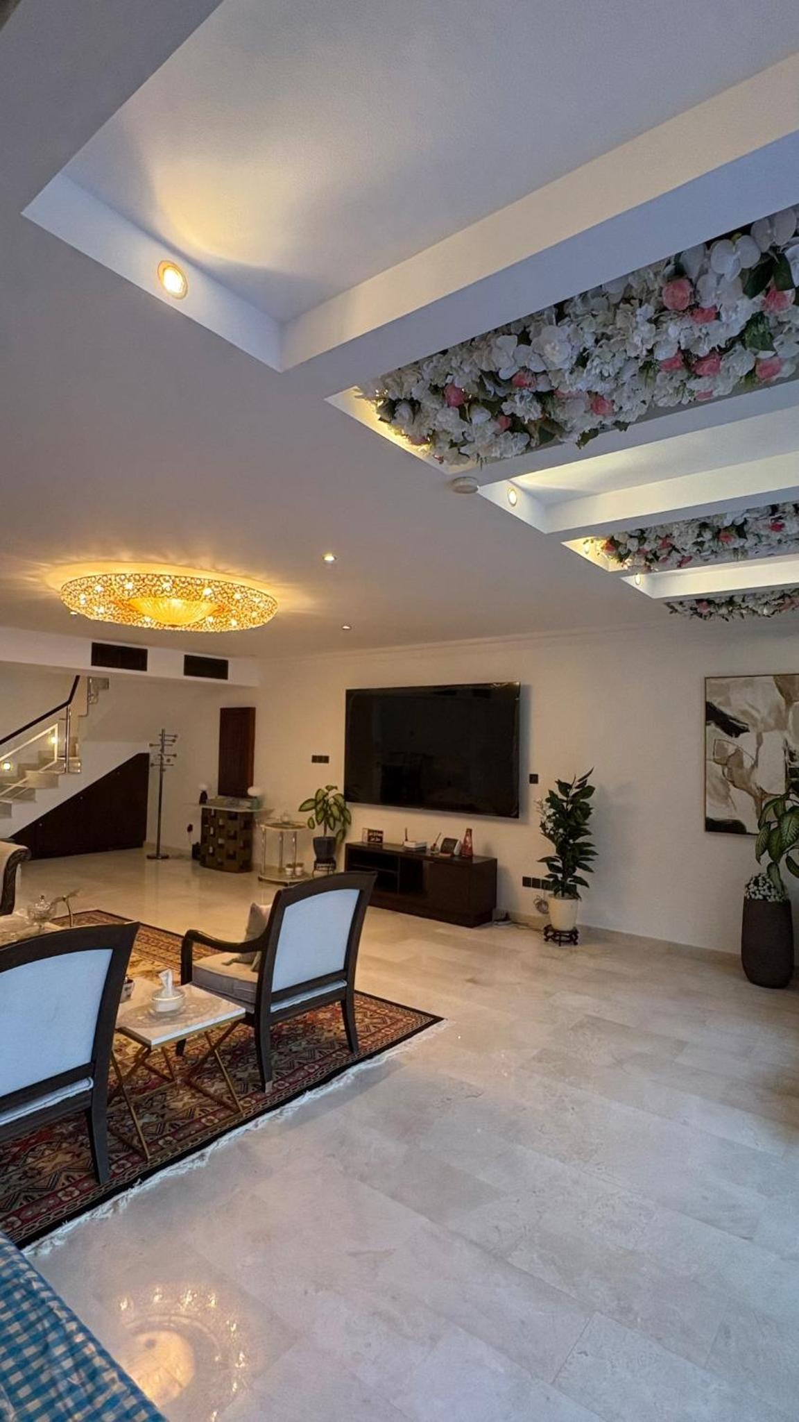 a large living room with a flat screen tv at شالية Vipمرسى البحرين 4 غرف مسبح خاص وشاطى in Muharraq +39 photos