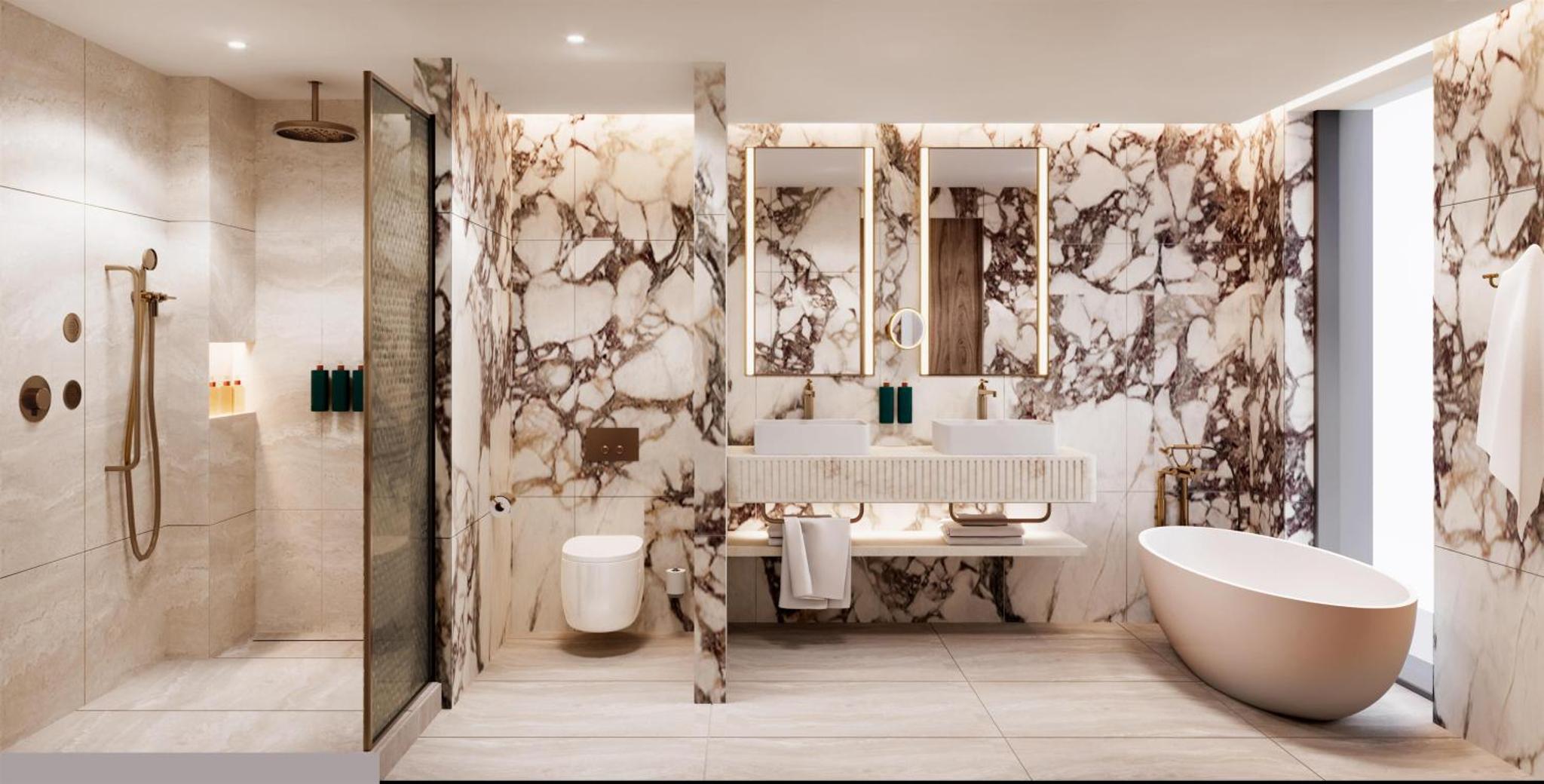 a bathroom with a tub and a sink at Hilton London Bankside in London