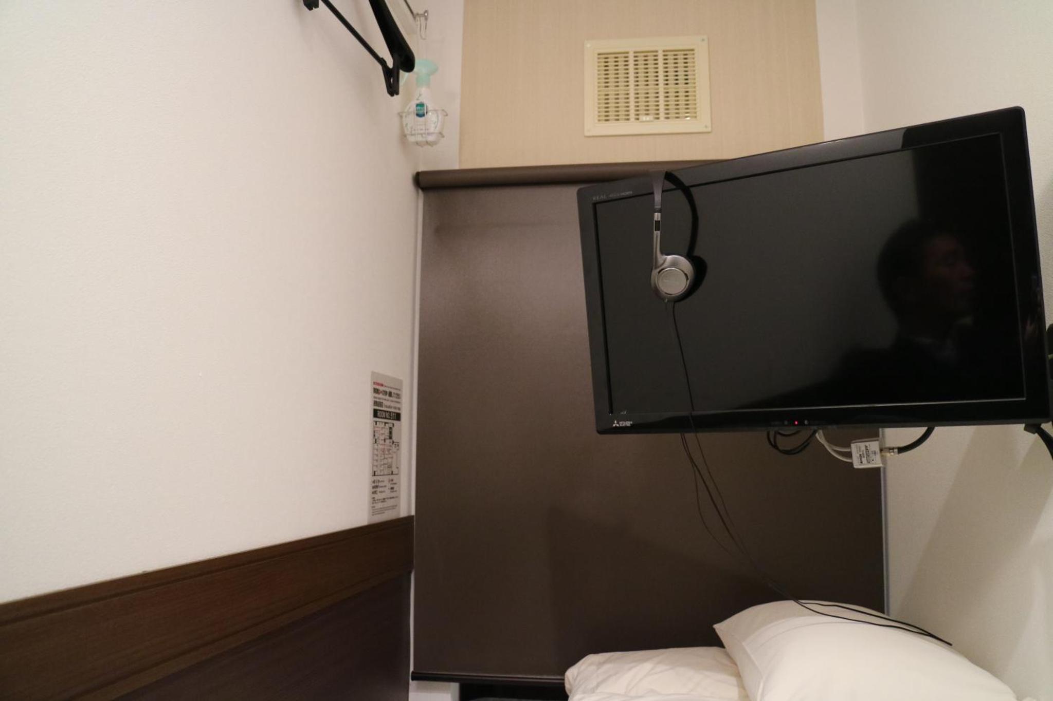 Sejour Inn Capsule — photo 12