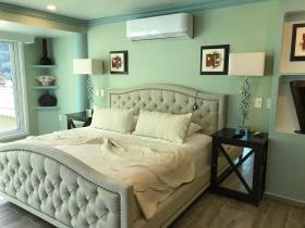 Room in Guest room - Private Suite with garden, swimming pool, and ocean views