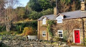 Welsh cottage with mountain and railway views