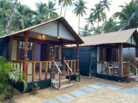 Tropical Bay Beach Cottages& Hostel