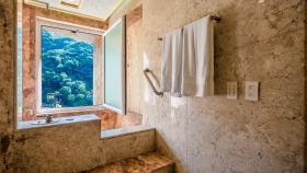 Luna Suite with two king size beds, with walk out terrace overlooking the beach