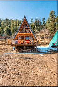 Dreams villa jibhi of vit in lushaal valley view A frame cabin