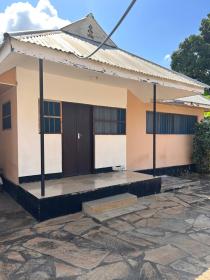 Private Master bedrooms with Wi-Fi Internet in Tanga Town