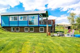 6pers. Modern house Iris with a view of the Lauwersmeer with 2 terraces